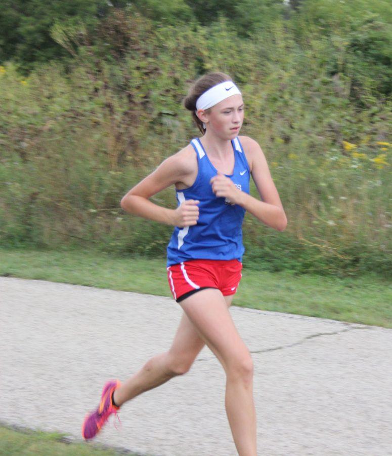 Sophomore Rae Dwyer running against Grant and Antioch on September 8, 2015
