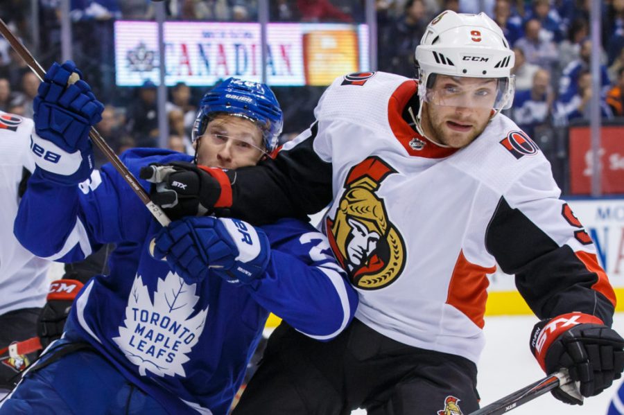 TORONTO, ON - OCTOBER 6: Connor Brown #28 of the Toronto Maple Leafs battles for the puck against Bobby Ryan #9 of the Ottawa Senators during the second period at the Scotiabank Arena on October 6, 2018 in Toronto, Ontario, Canada. (Photo by Kevin Sousa/NHLI via Getty Images)